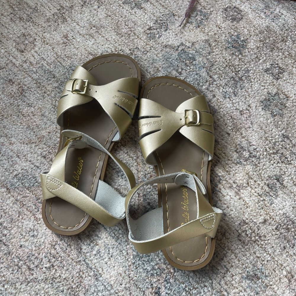 The Saltwater Sandal in Gold size: 5